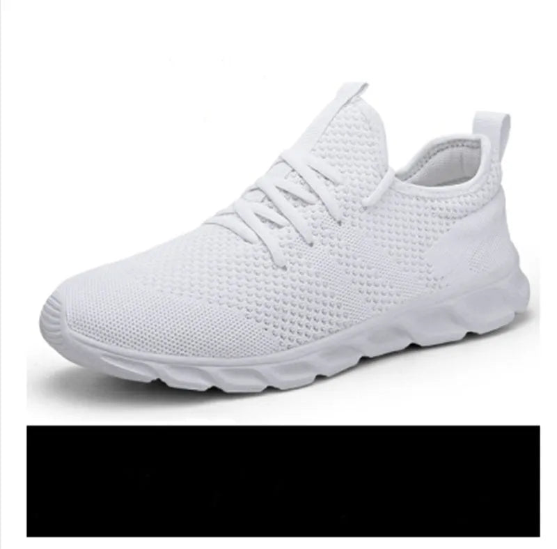 Men's black and white casual sneakers with mesh upper and lace-up closure for jogging.