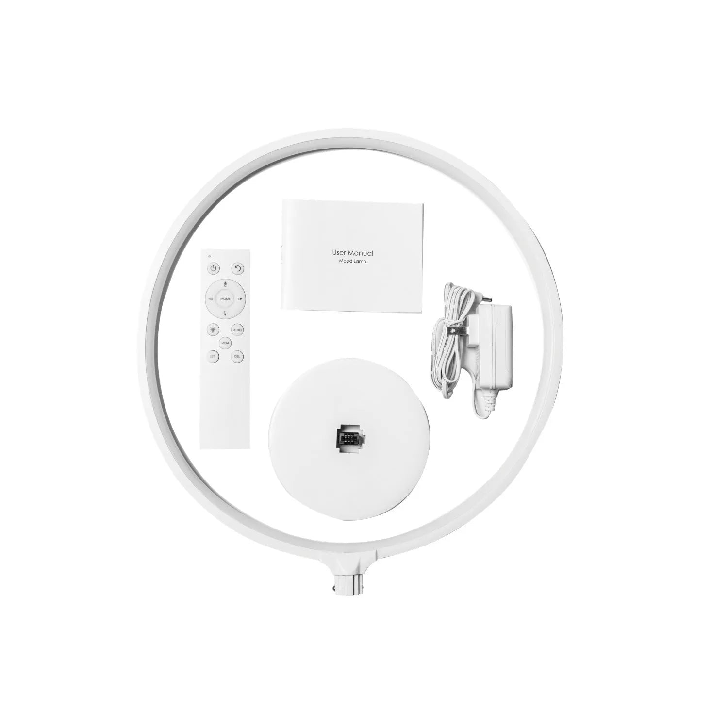 White full moon shaped table lamp with soft glow, placed on a surface with remote control.