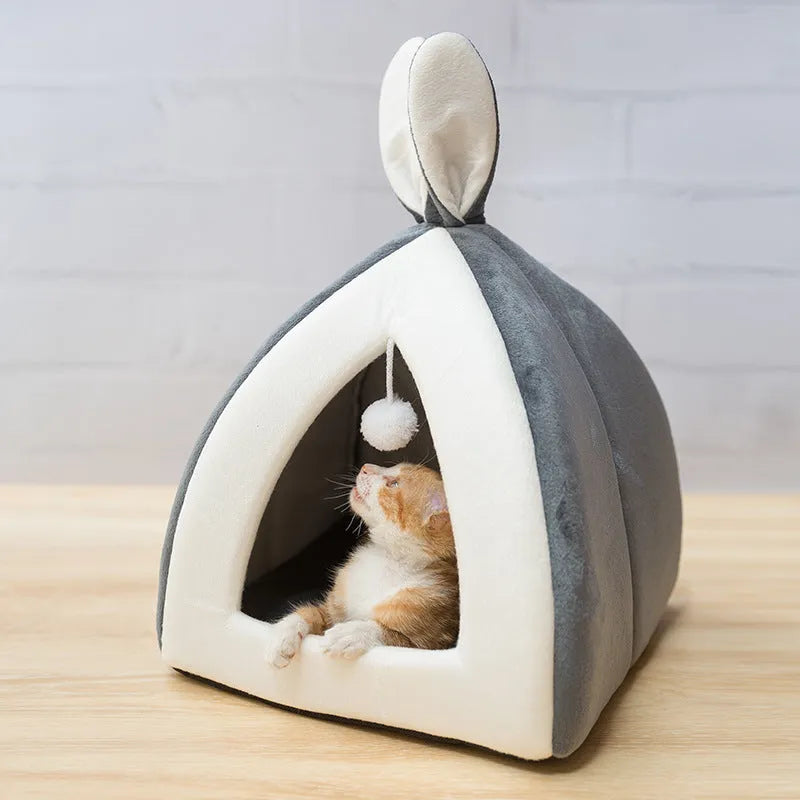 Grey cloth cat house villa pet bed for indoor use with enclosed design.