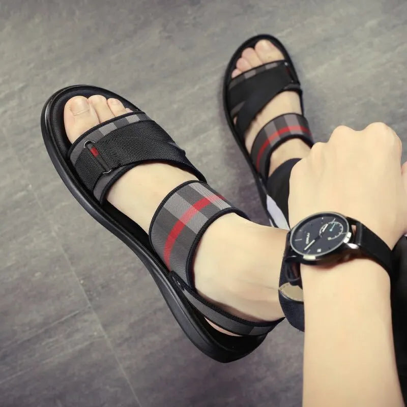 Youth leisure sports sandals with Lycra upper and polyurethane sole shown with international size chart.