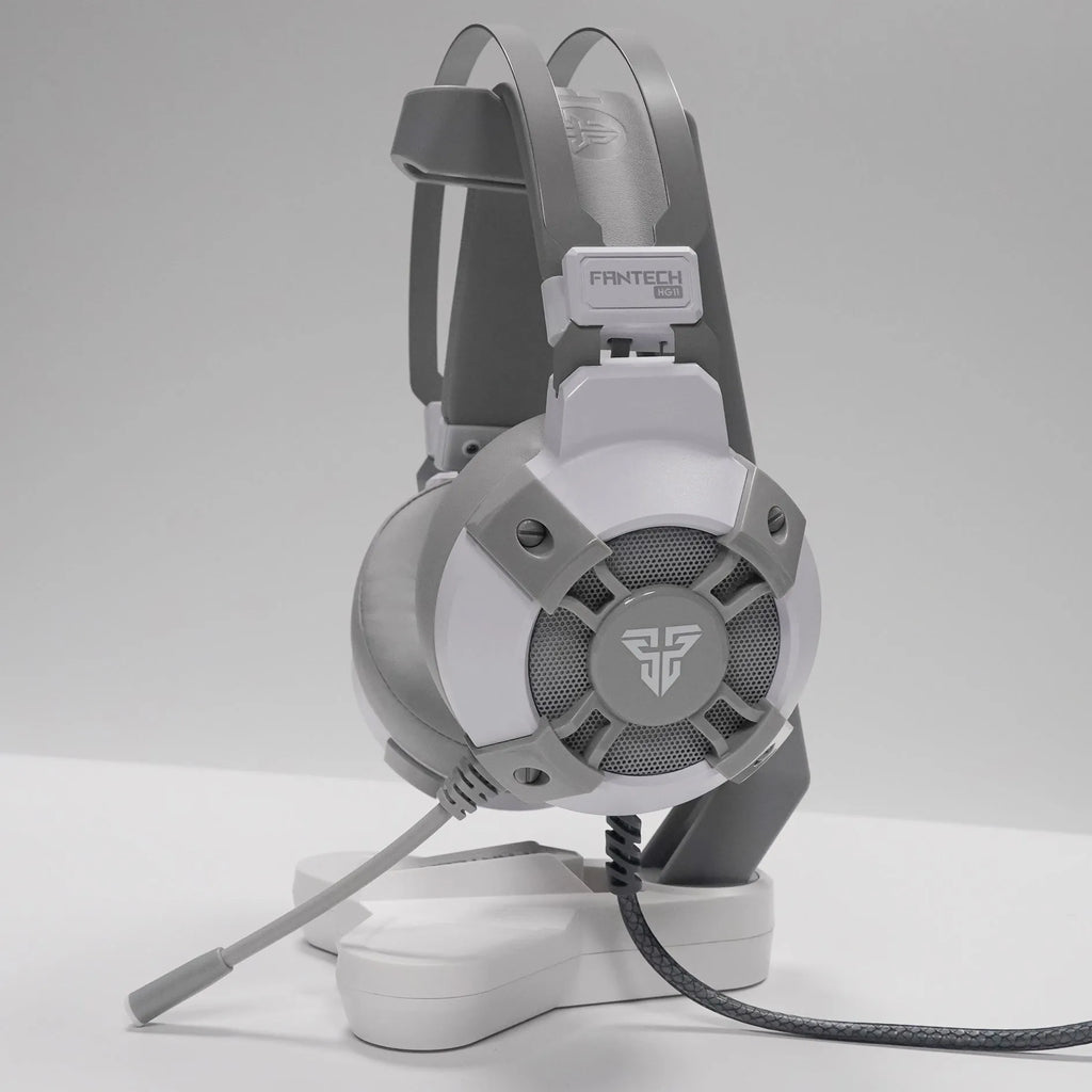 Black FANTECH HG11 USB gaming headset with large ear cups, RGB lighting, and a 2.1m cable with inline remote control.