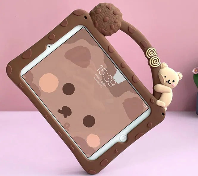 Brown cartoon silicone protective sleeve case for iPad tablets on a flat surface