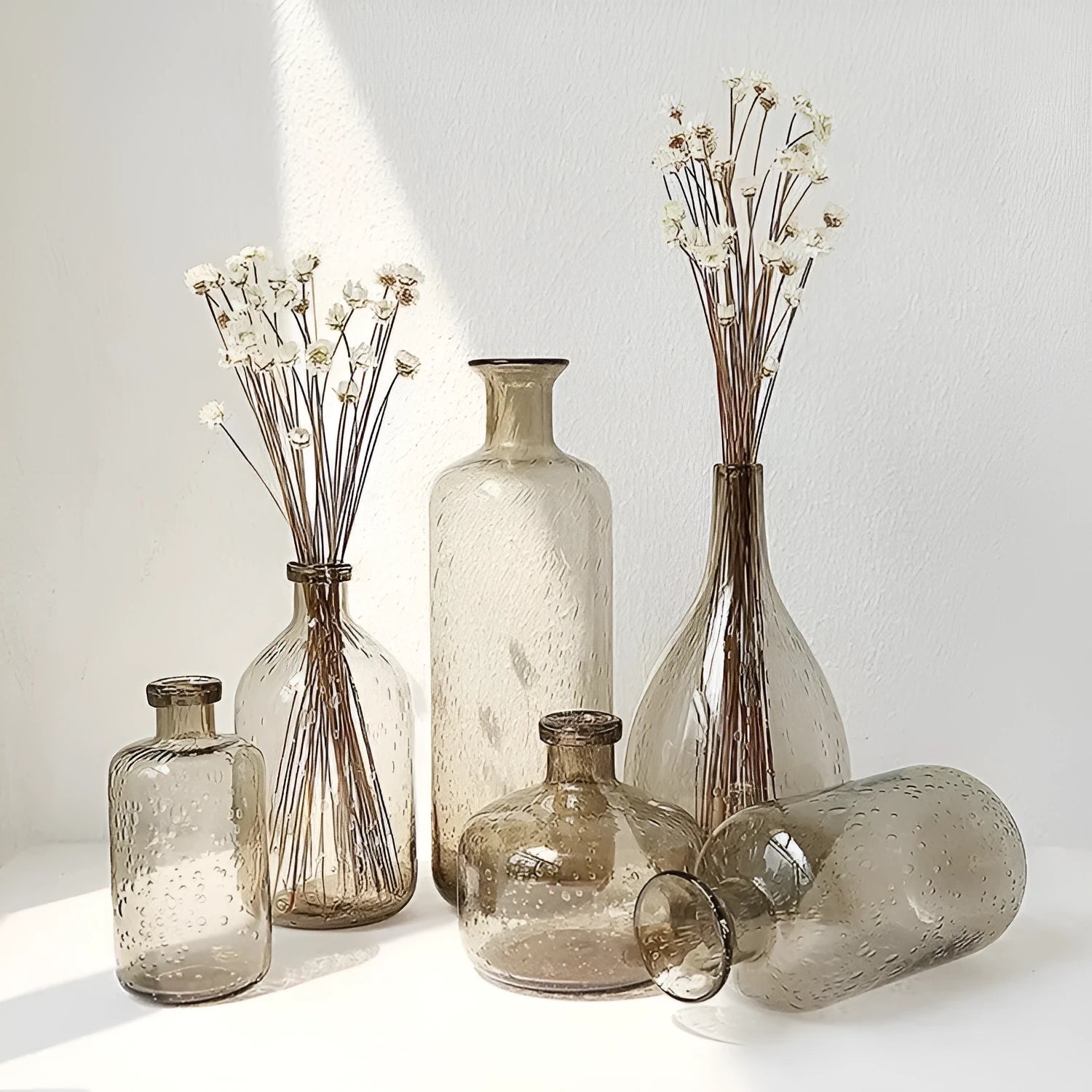 Geometric bubble glass vase with stained construction in grey colour