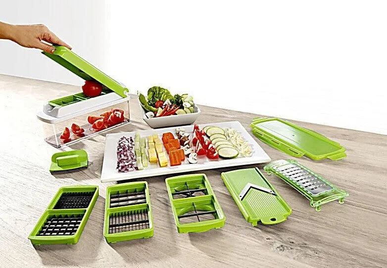 Green manual vegetable chopper with stainless steel blades and handheld design for kitchen food preparation