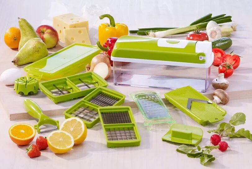 Green manual vegetable chopper with stainless steel blades and handheld design for kitchen food preparation