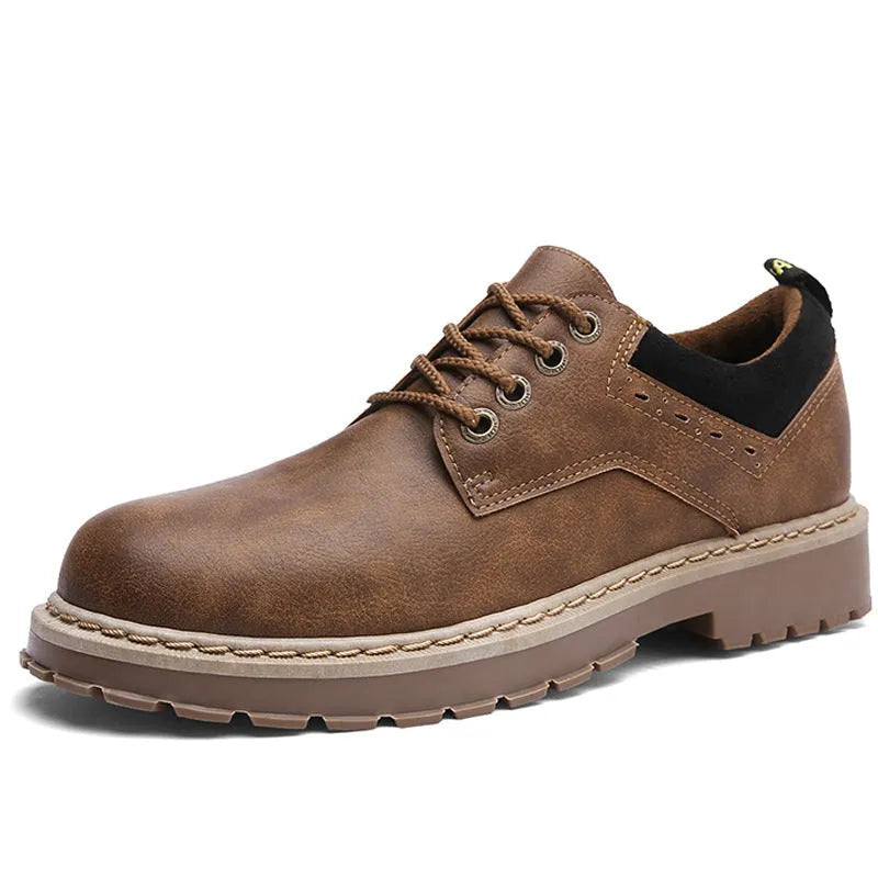 Men's black casual lace-up shoes with round toe, flat heel, and rubber sole on a white background.
