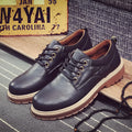 Men's black casual lace-up shoes with round toe, flat heel, and rubber sole on a white background.