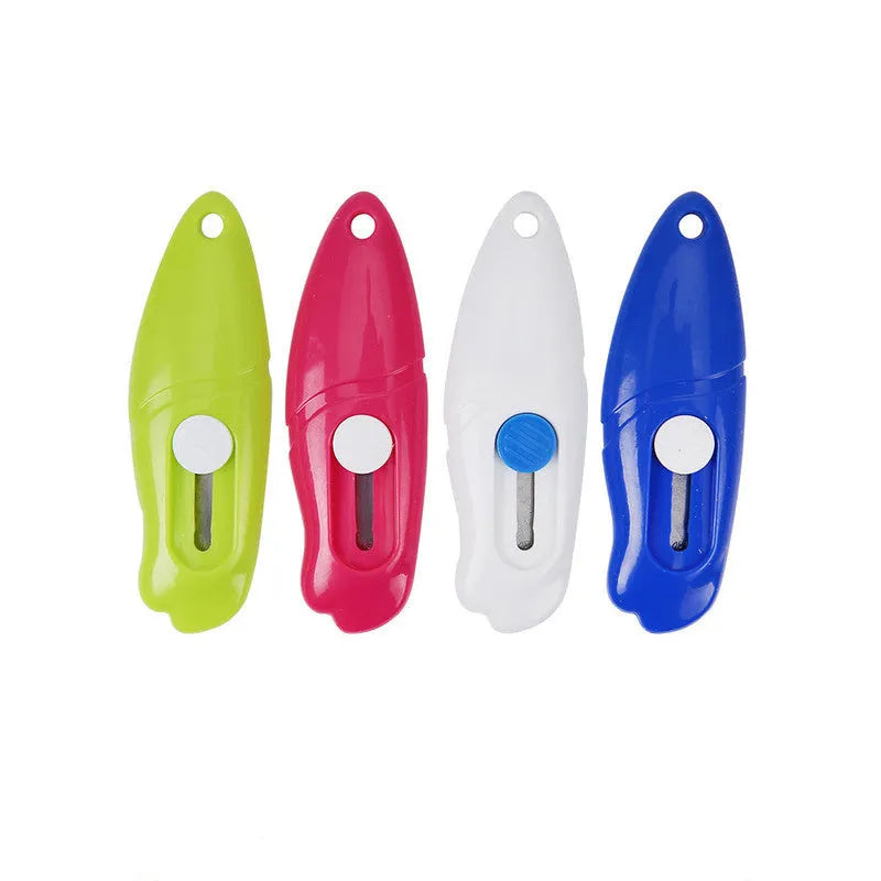 Cartoon-shaped plastic and metal art knife for manual production and crafting