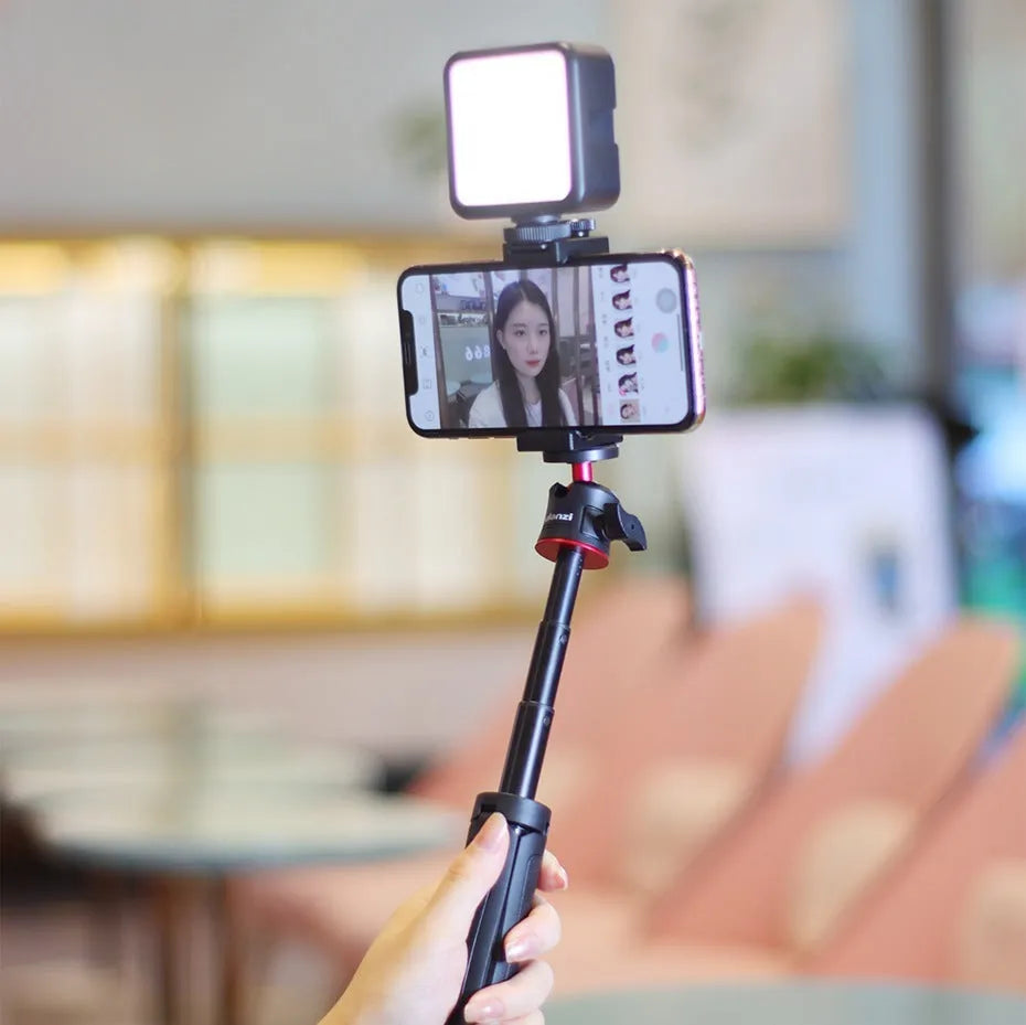 Combo 8 mobile phone vlog bracket set with fill light and stand, showing compact size.