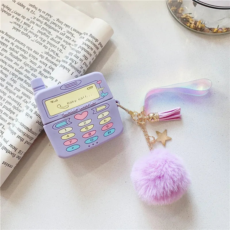 Purple silicone protective case for Apple AirPods with attached fur ball pendant