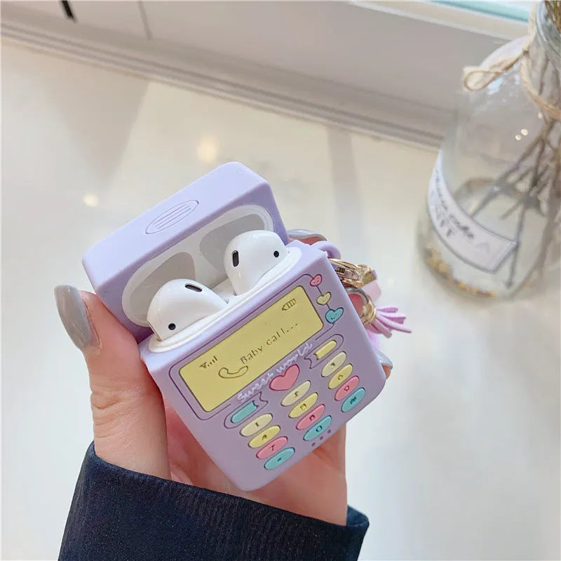 Purple silicone protective case for Apple AirPods with attached fur ball pendant
