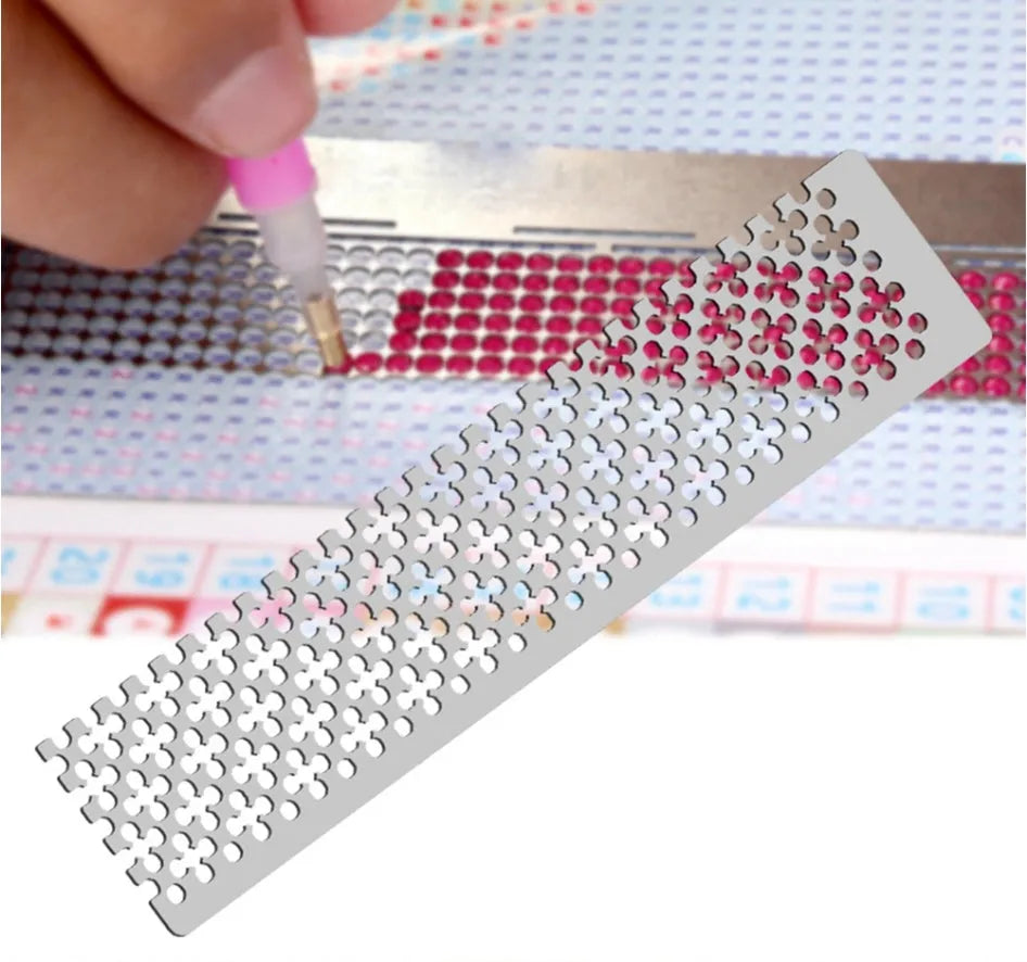 Stainless steel diamond painting grid ruler showing square and round diamond measurement patterns