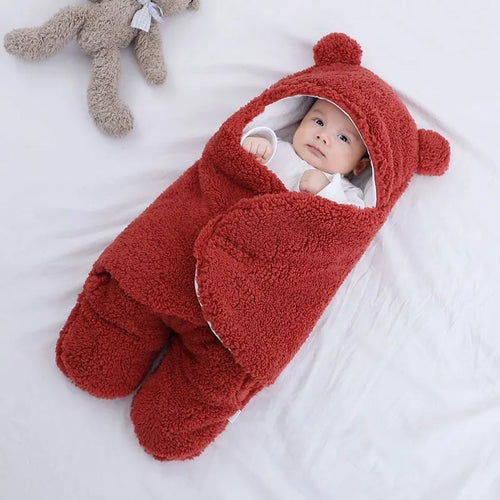 Cotton blend baby quilted sleeping bag wrapper in grey, shown laid flat.