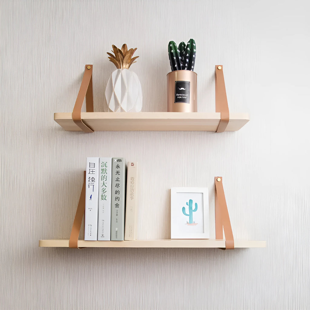 Nordic style pine wall mounted bookshelf measuring 50x16cm holding books and decor