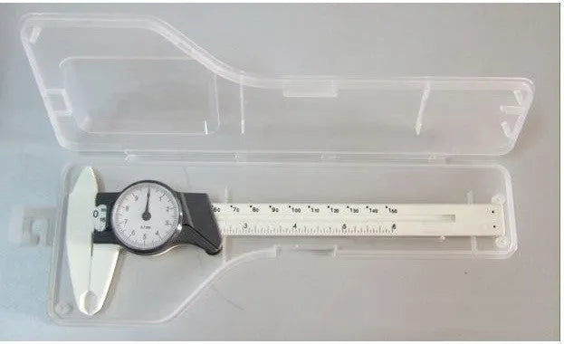 Black and white plastic vernier caliper showing 0-150mm scale with 0.1mm graduations.