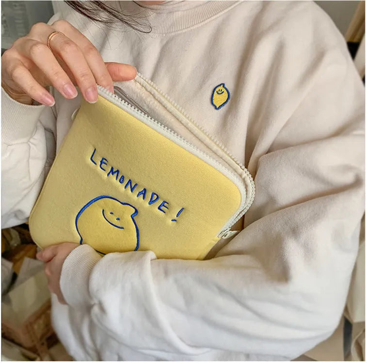 Korean Ins polyester tablet bag with lemon embroidery, letter details, fruit pattern, zip closure, 11 inch and 15 inch sizes.