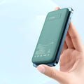 Maiduo Magsafe-compatible magnetic wireless power bank in mint green, showing clip and dimensions.