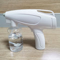White cordless electric handheld spray disinfection gun with USB charging cable