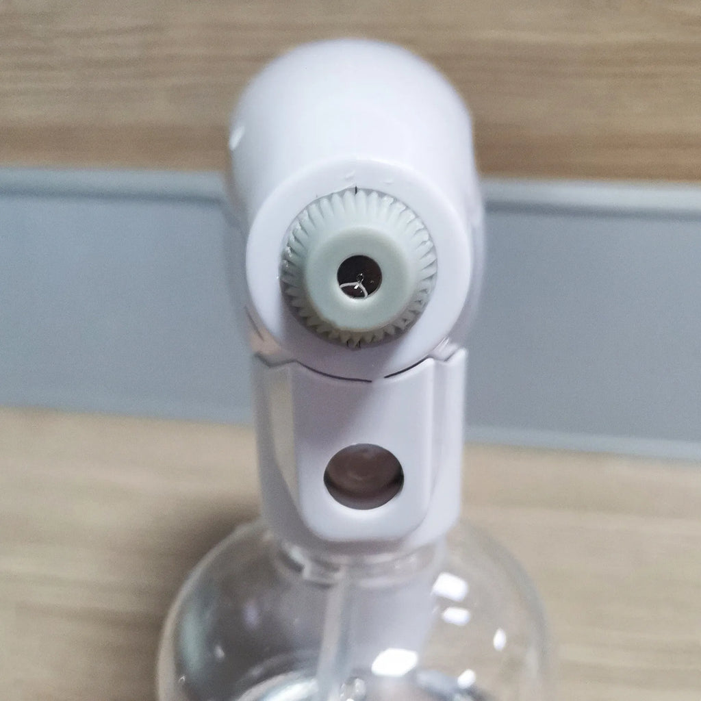 White cordless electric handheld spray disinfection gun with USB charging cable