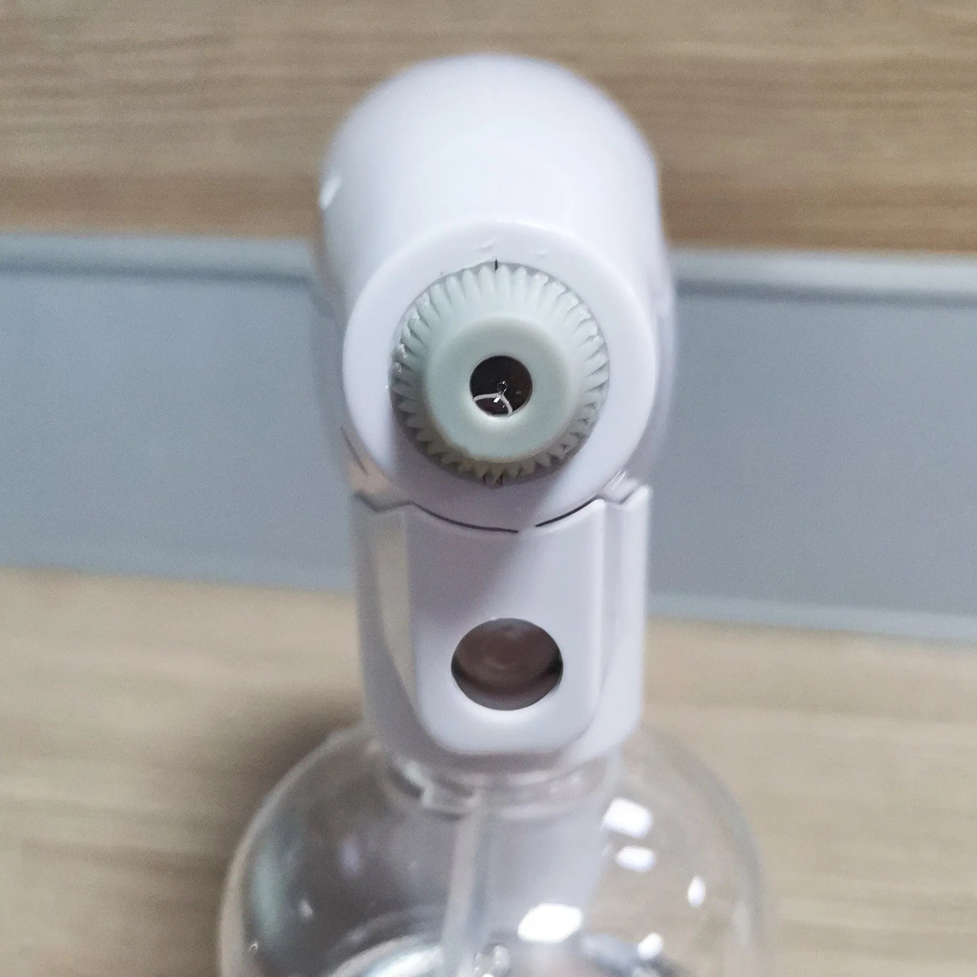 White cordless electric handheld spray disinfection gun with USB charging cable