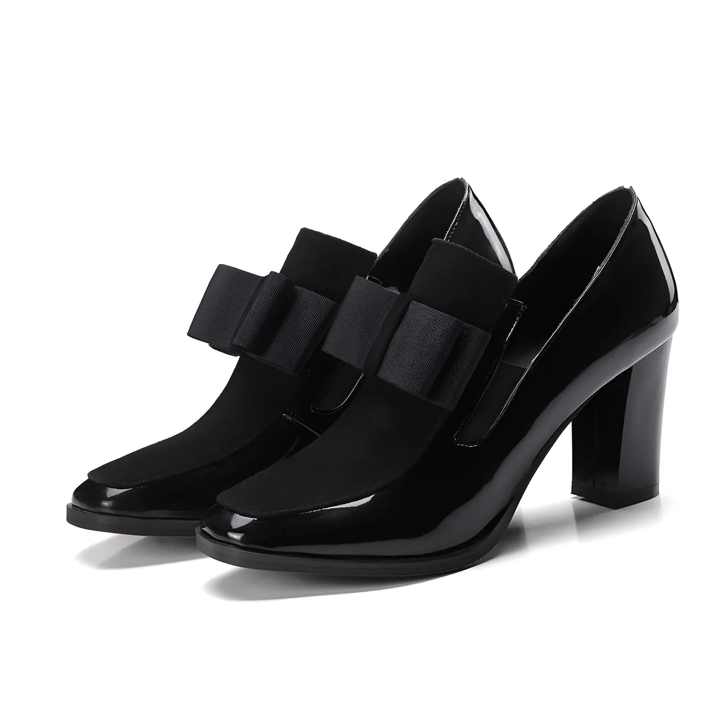 Women's black patent leather high heel shoes with a thick block heel and square toe, shown in a large size.