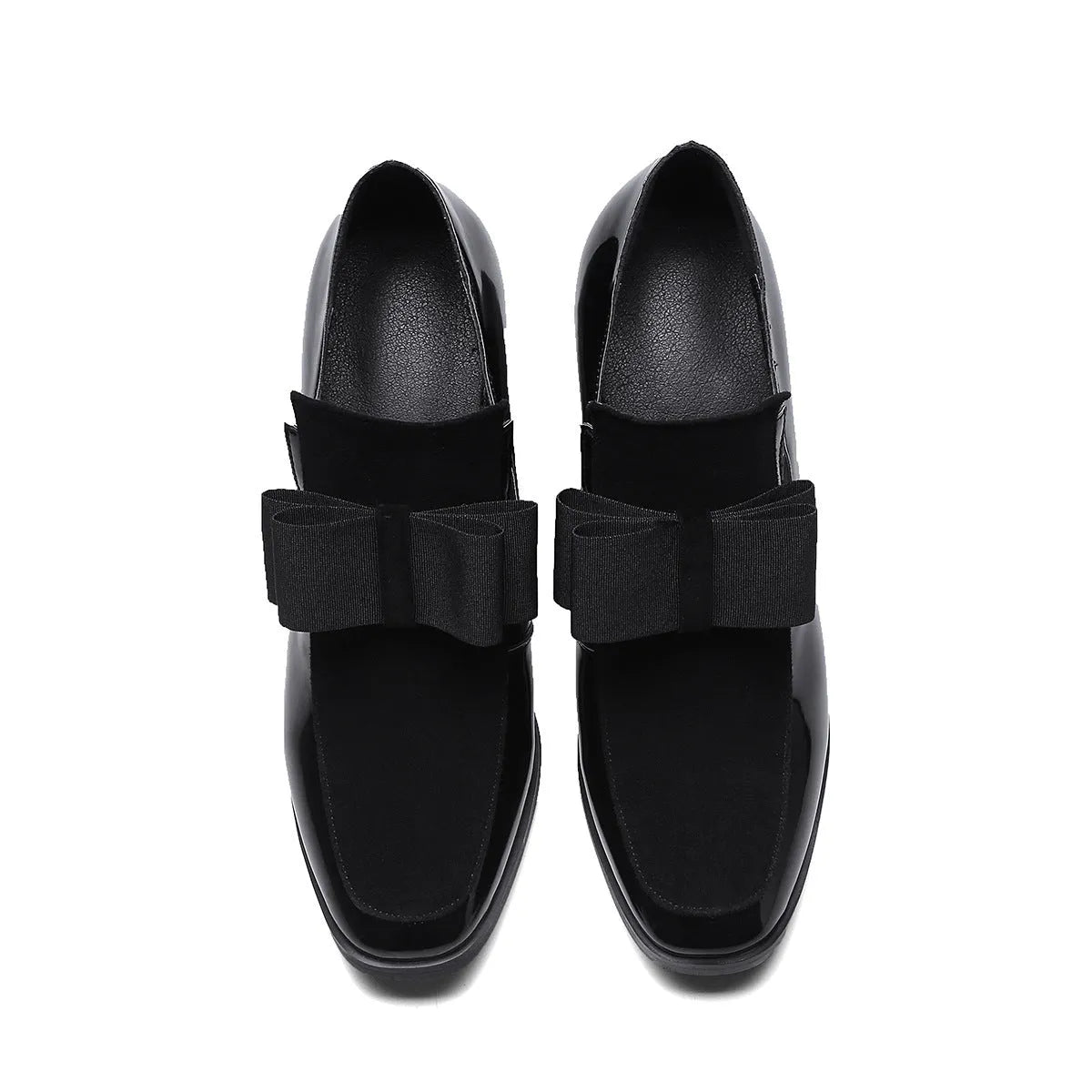 Women's black patent leather high heel shoes with a thick block heel and square toe, shown in a large size.
