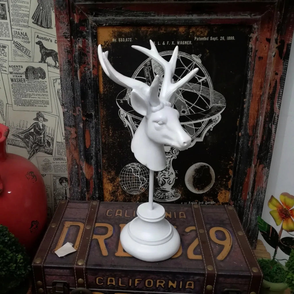 Tall natural resin animal sculpture decoration in black, white, or wood colour finish, 32cm high.