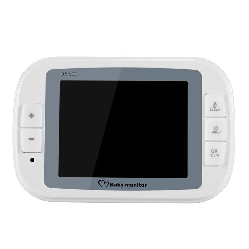 White UFO-shaped wireless baby monitor and camera on a nursery shelf.