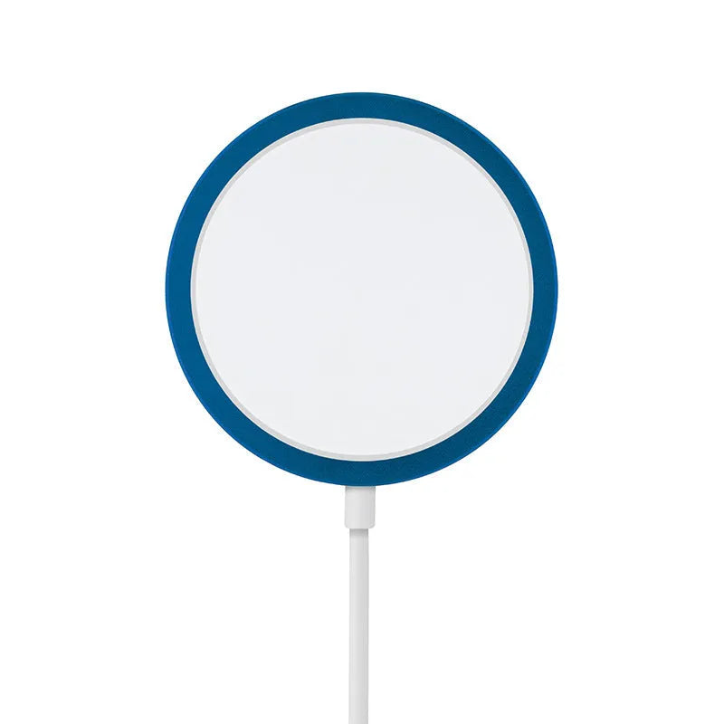 Silver metal magnetic wireless charger for Apple iPhone on a table