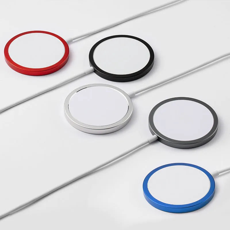 Silver metal magnetic wireless charger for Apple iPhone on a table