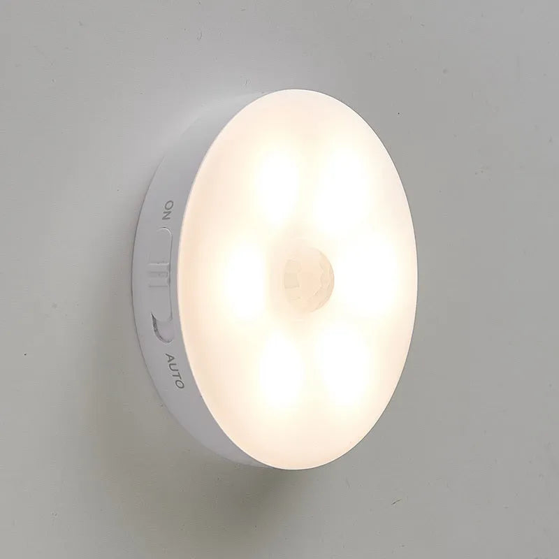 Wireless motion sensor LED light with rotation sensor for cabinets and hallways
