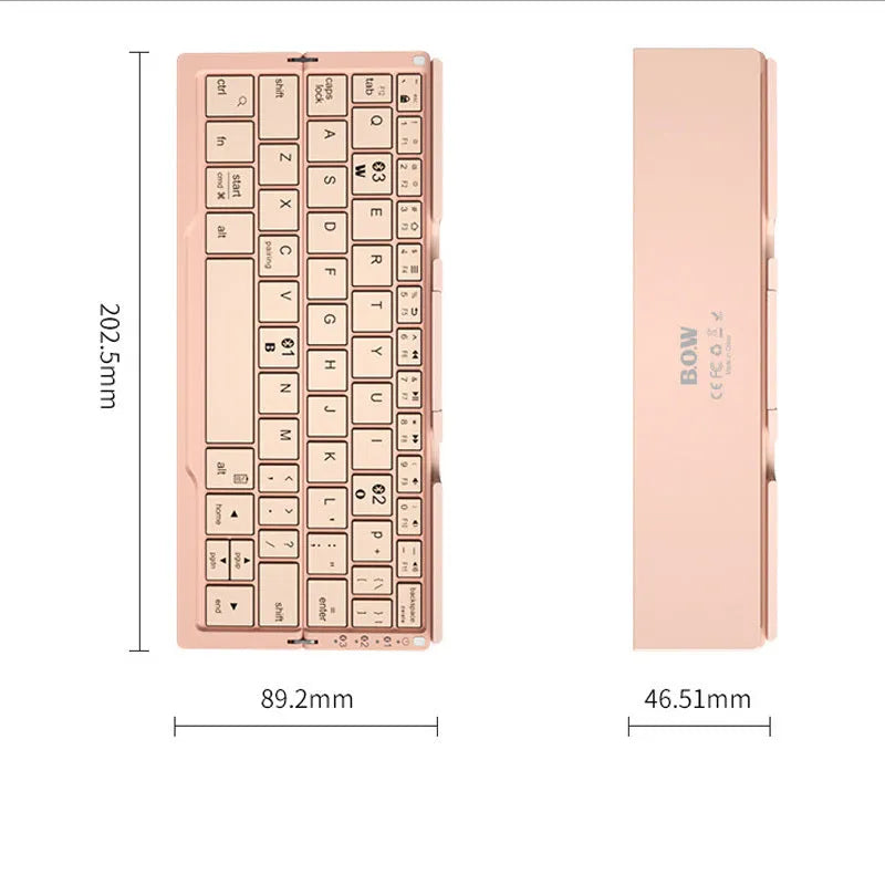 Silver folding Bluetooth keyboard open with tablet on stand, showing compact size and 60-key layout