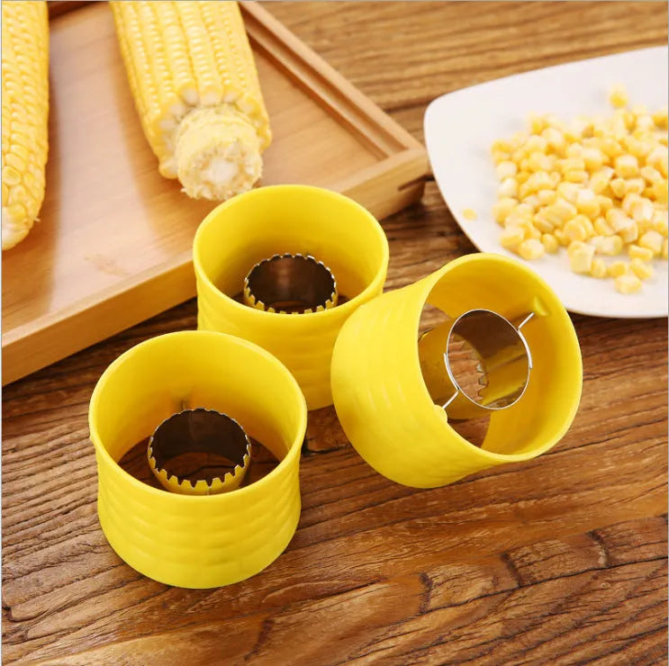 Yellow manual corn grinder thresher with corn-shaped design and PP grip