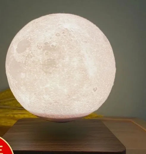 Magnetic levitation 3D moon night light, 14cm diameter, floating above a wooden base with touch switch.