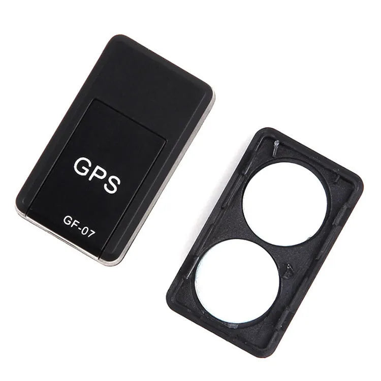 Black magnetic GPS tracker device measuring 35x20x14mm with USB charging cable for vehicle and personal tracking