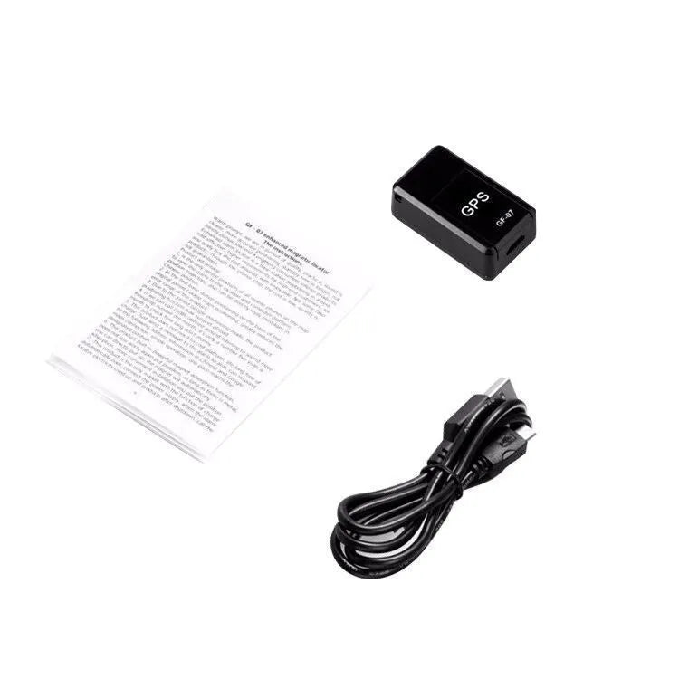 Black magnetic GPS tracker device measuring 35x20x14mm with USB charging cable for vehicle and personal tracking