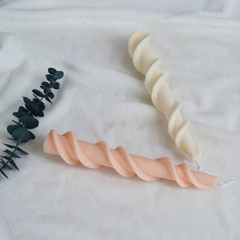 Screw wax silicone mould for rotating lace candles in photograph colour showing spiral pattern design