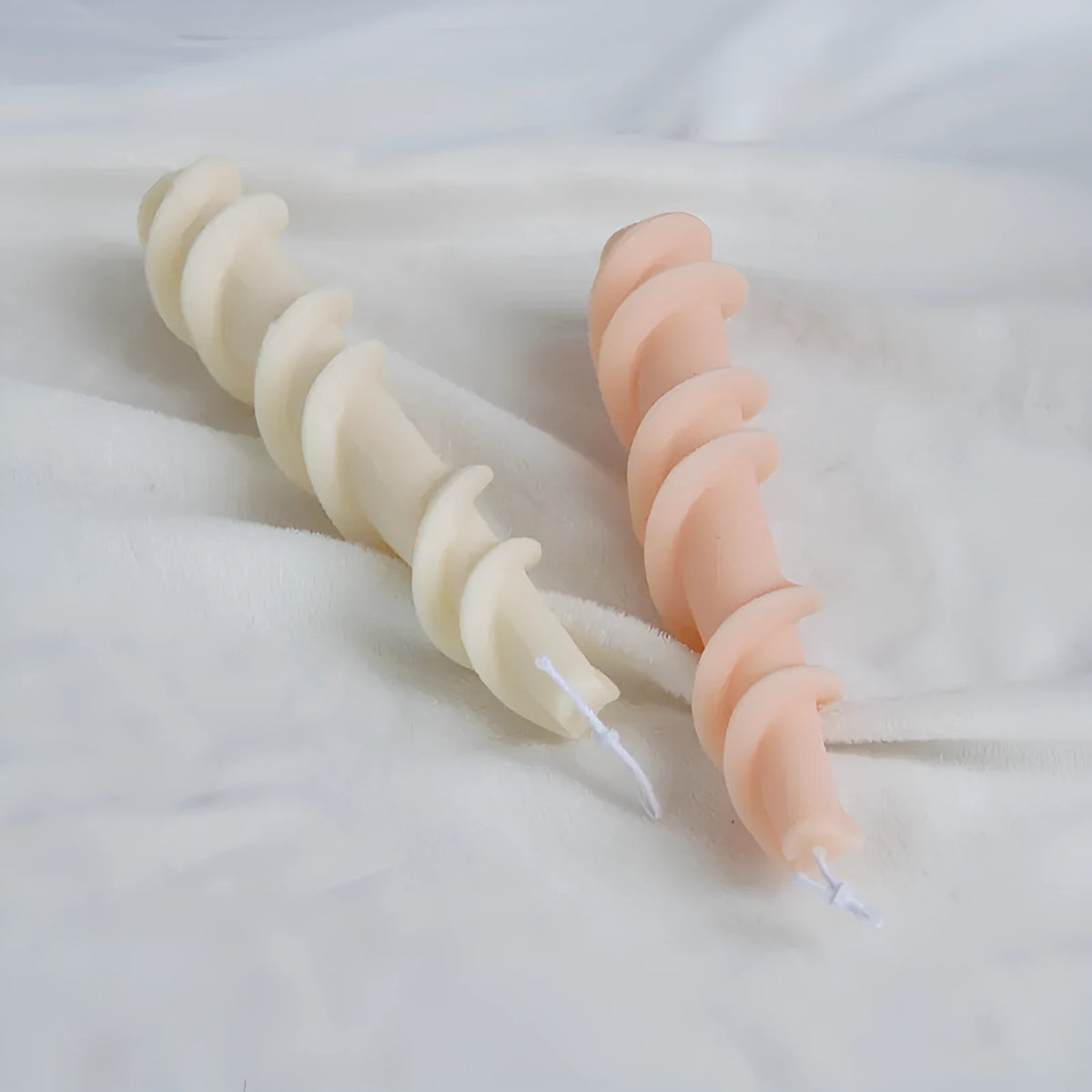 Screw wax silicone mould for rotating lace candles in photograph colour showing spiral pattern design