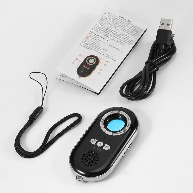 Compact black wireless signal detector with dimensions 85mm by 40mm for travel security and anti-theft monitoring.
