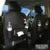 PU leather car seat back storage hanging bag with multiple pockets and built-in trash can