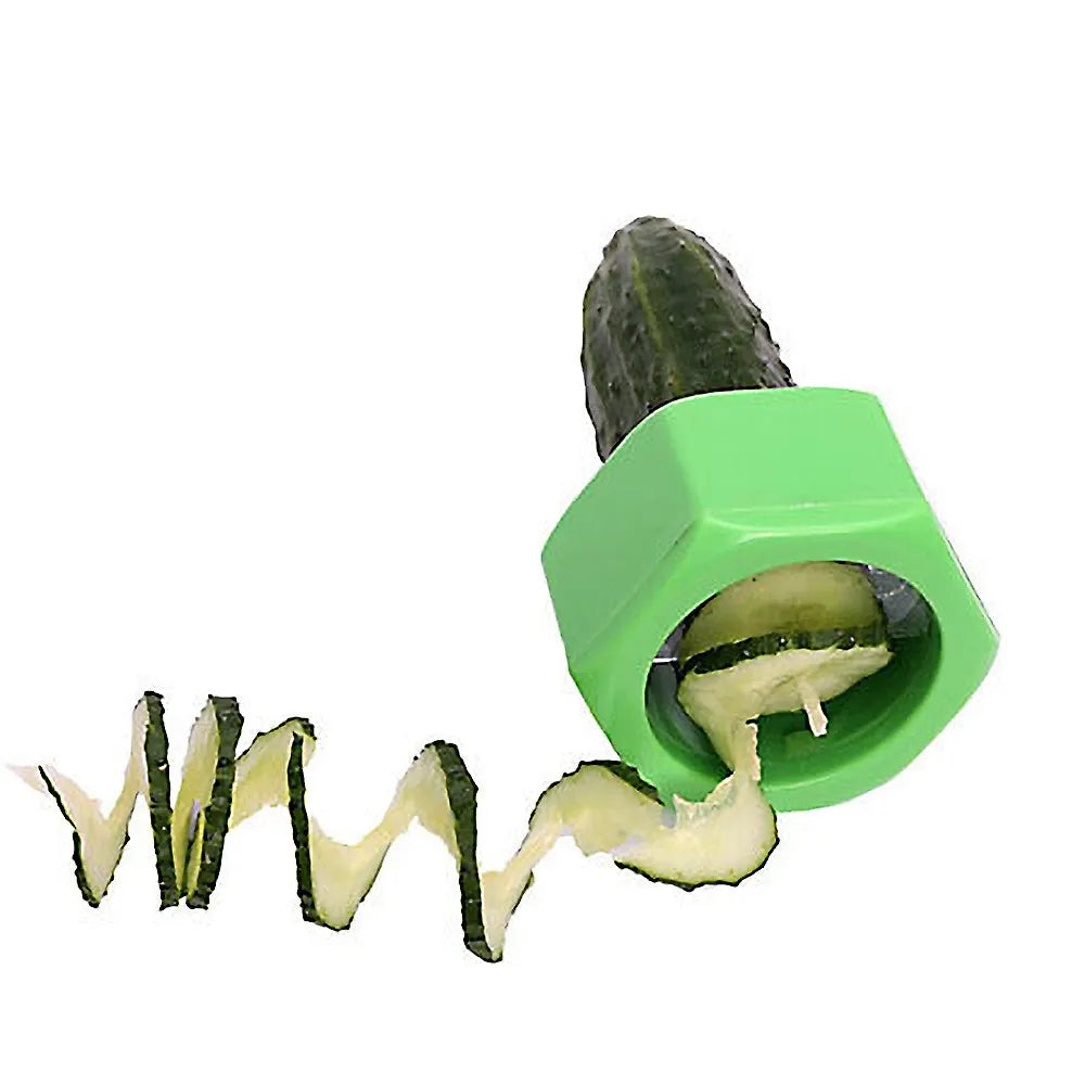 Yellow and green plastic vegetable spiral slicer for cucumbers on a kitchen counter.