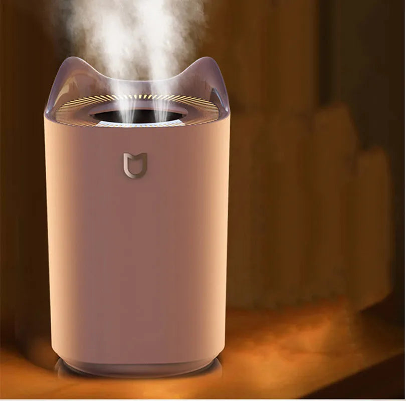 Coral pink double spray humidifier with three fog outlets and USB power cable