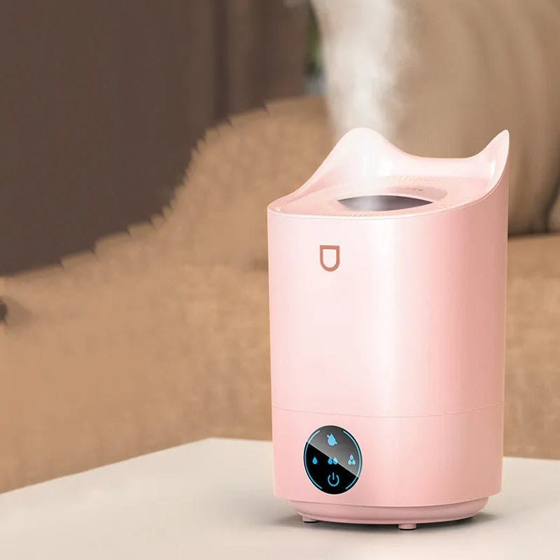 Coral pink double spray humidifier with three fog outlets and USB power cable