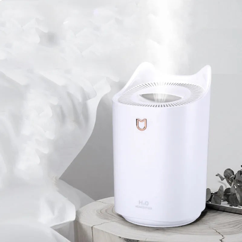 Coral pink double spray humidifier with three fog outlets and USB power cable