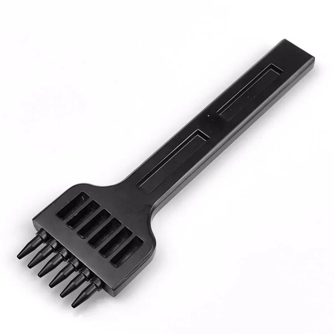 Black Wuta manual leather round hole punch tool showing a row of steel teeth with 4mm spacing.