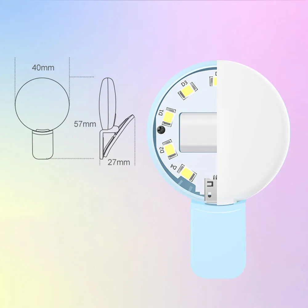 Mini clip-on LED fill light attached to mobile phone for selfie photography