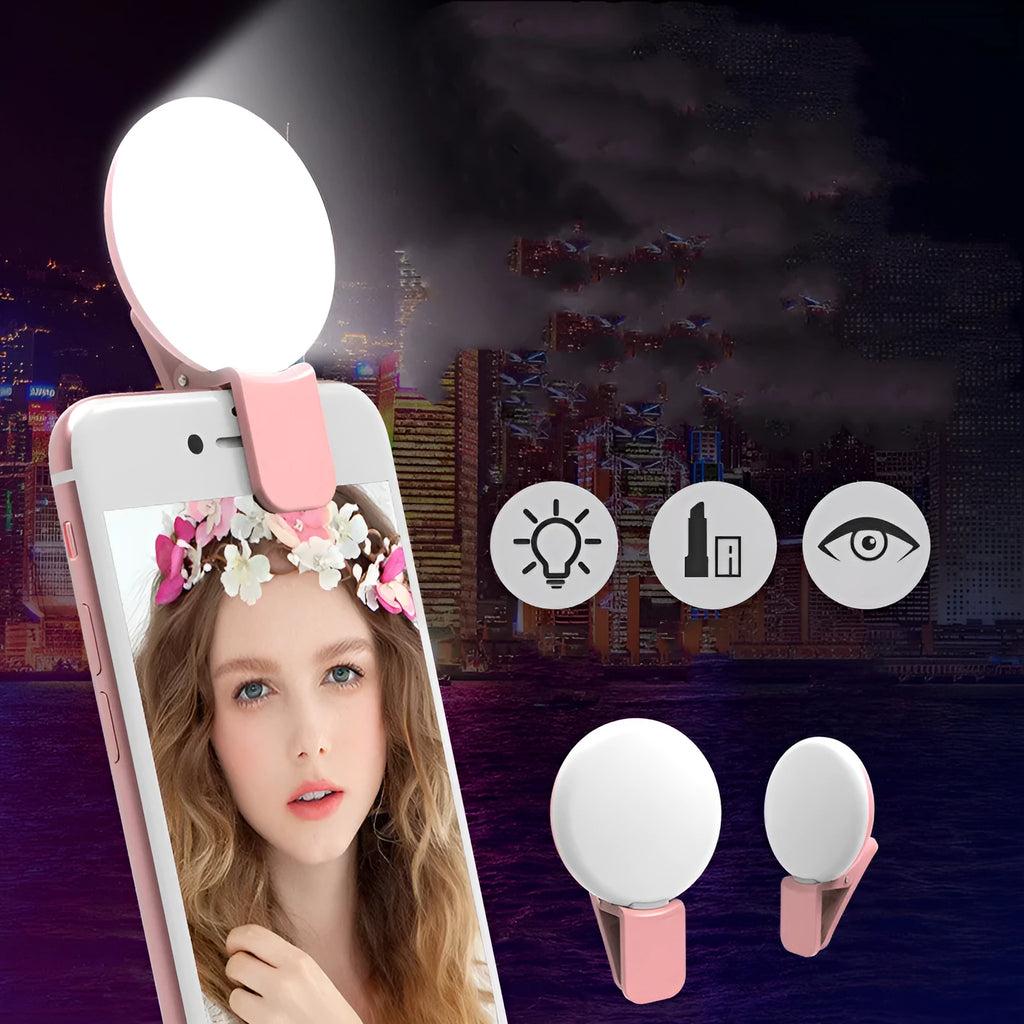 Mini clip-on LED fill light attached to mobile phone for selfie photography