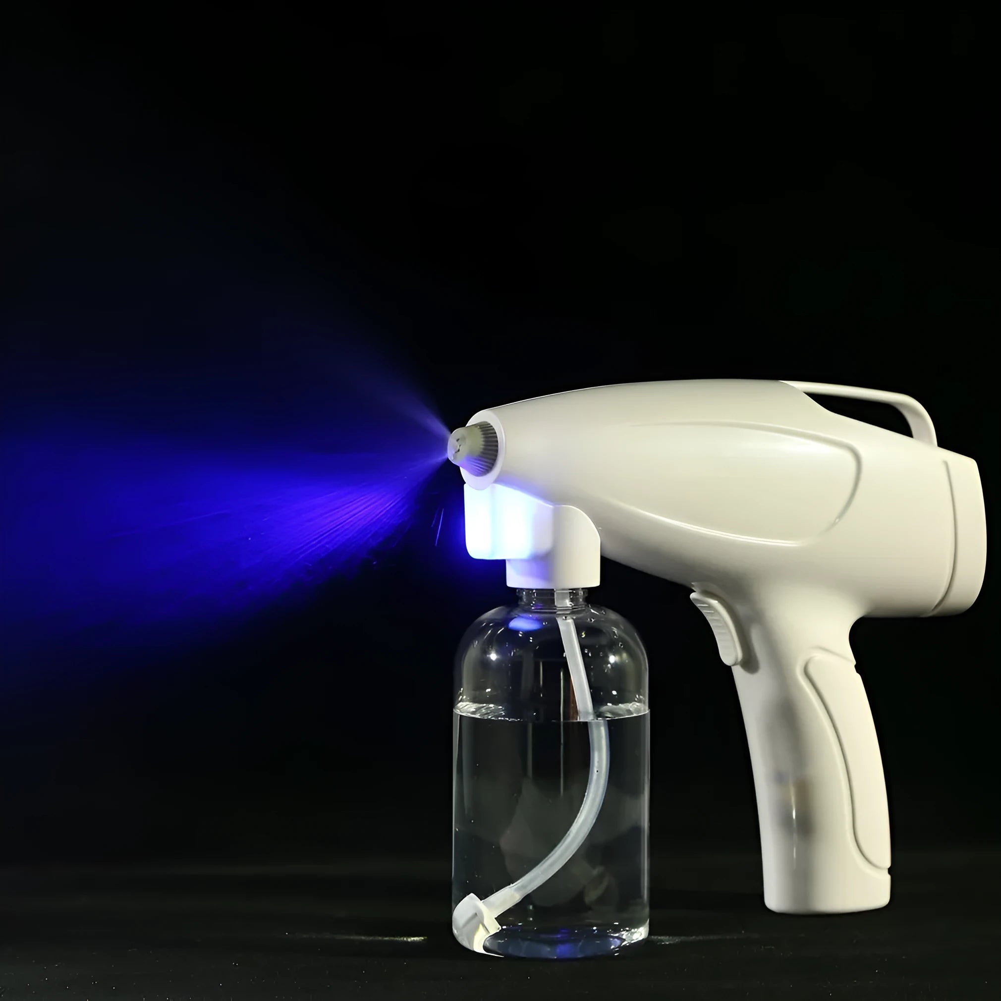 White cordless electric handheld spray disinfection gun with USB charging cable