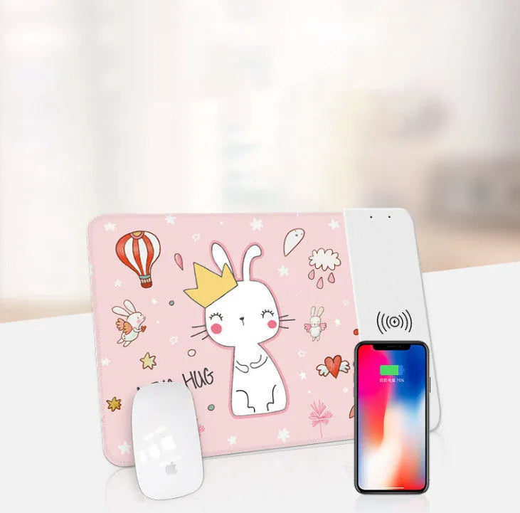 Cartoon design wireless charging mouse pad with RGB lighting, showing cloth surface and USB cable.
