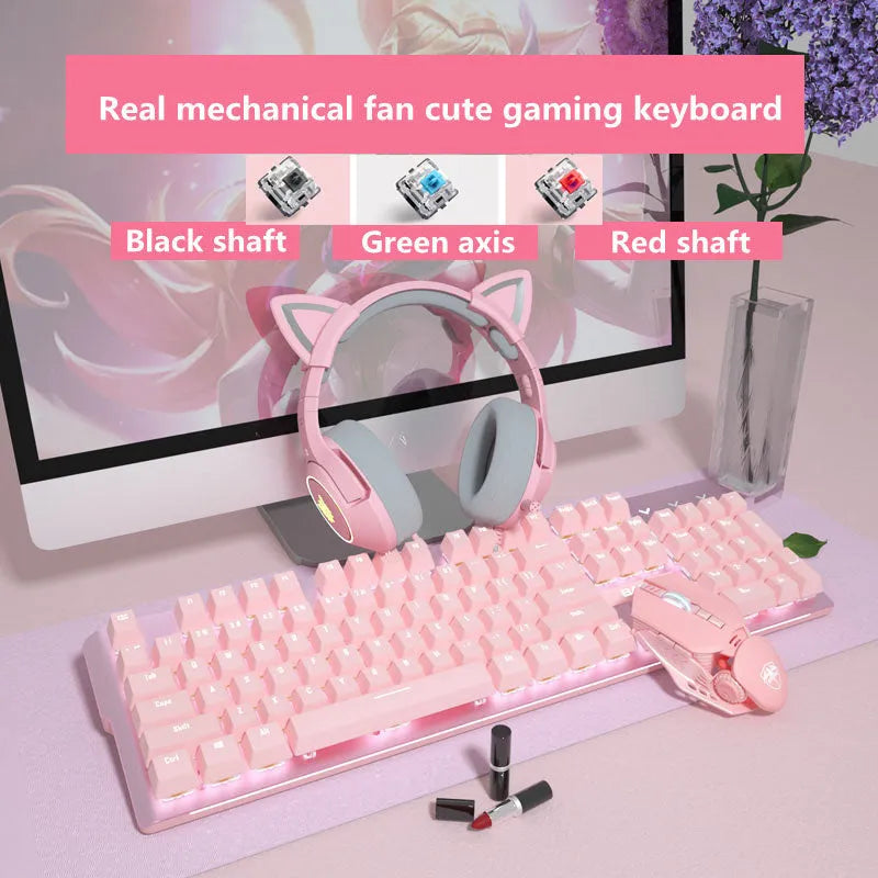 Pink wired mechanical keyboard and matching mouse set on a desktop.